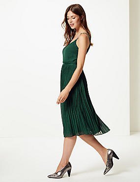 green folded midi dress with silver heels
