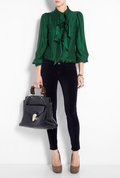 green ruffled bow blouse with black skinny jeans