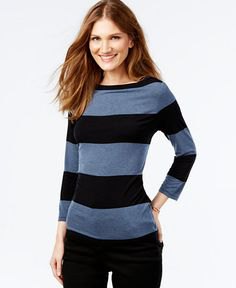 gray and black wide striped long-sleeved top with skinny jeans