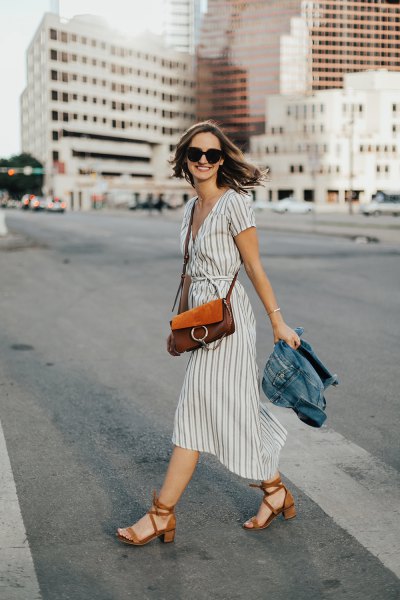 gray and white midi dress with a ruched waist and red heels