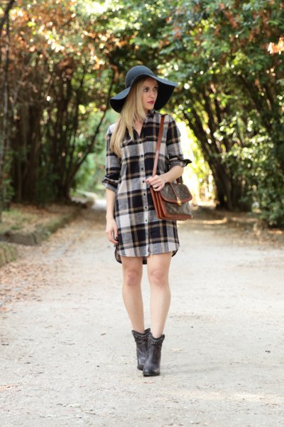 gray and white checked flannel shirt dress with black floppy hat