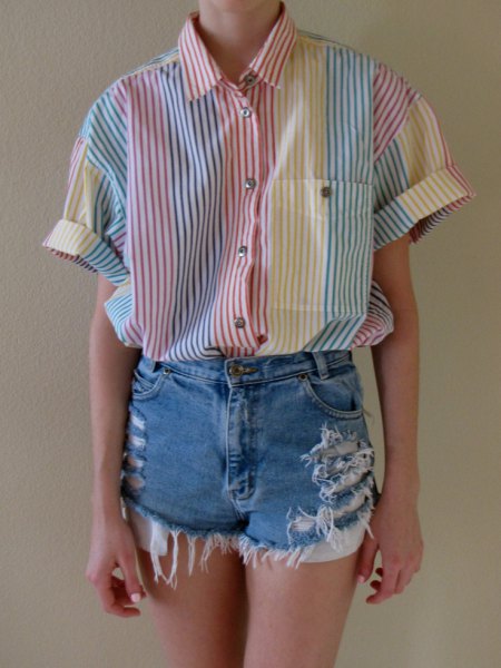 gray and white striped shirt with buttons and ripped denim shorts