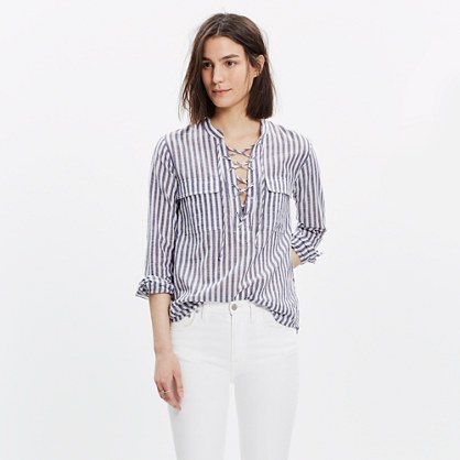gray and white striped lace-up shirt white jeans