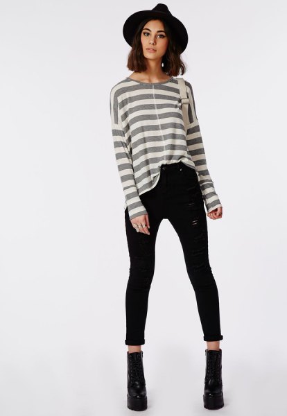 gray and white striped long-sleeved T-shirt with high-waisted black skinny jeans with cuffs