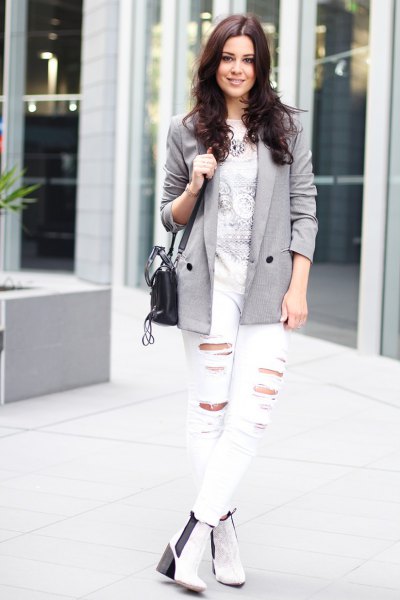 gray blazer with printed t-shirt and white jeans