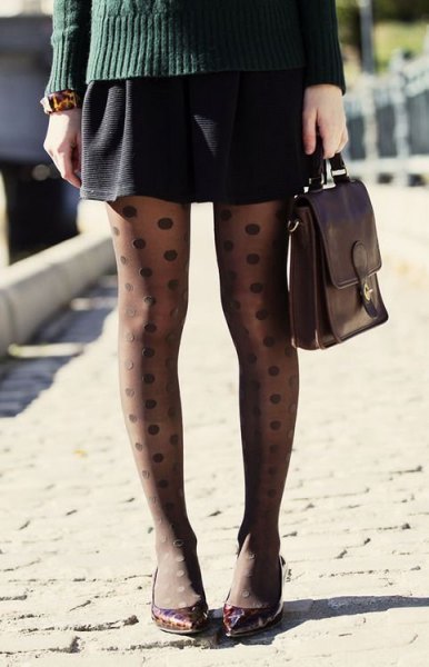 gray knitted sweater with black mini skirt and dotted tights