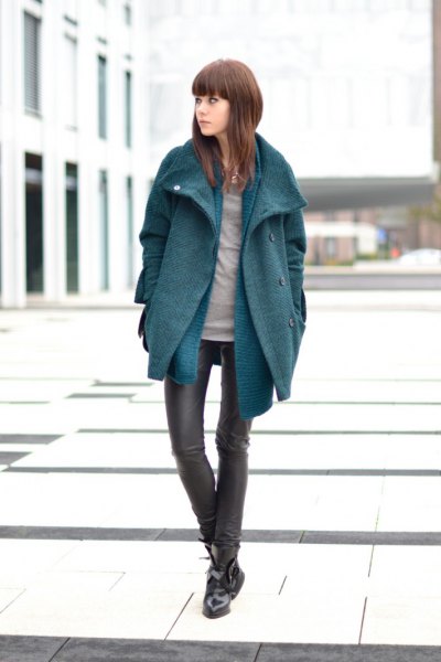 gray cocoon coat with blue chambray longline shirt and leather gaiters