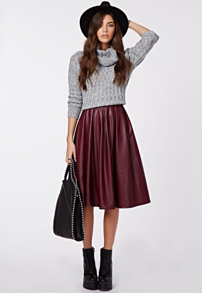 Short knitted sweater with gray waterfall neckline and flared skirt made of midi silk
