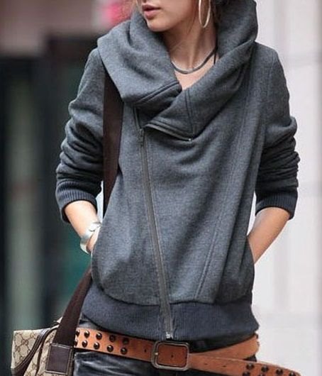 gray hooded sweater with hooded neckline, jeans and studded belt