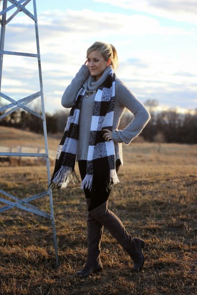 gray sweater with waterfall neckline and checked fringed scarf