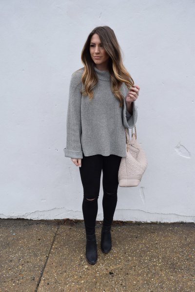 gray top with waterfall neckline and black super skinny jeans