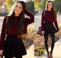gray slim fit sweater with round neckline and black skater skirt with high waist