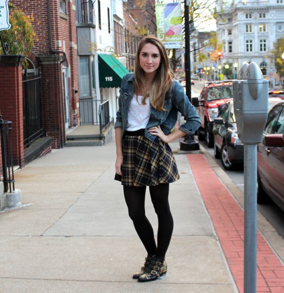 gray denim jacket with black checked skirt and leggings