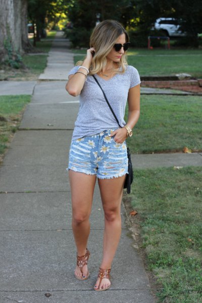 gray, fitted t-shirt with cut off blue denim shorts