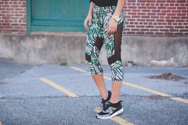 gray, cropped mesh leggings with floral pattern and matching running shoes