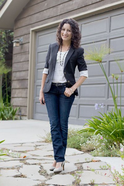gray half-sleeve blazer with white blouse and dark jeans