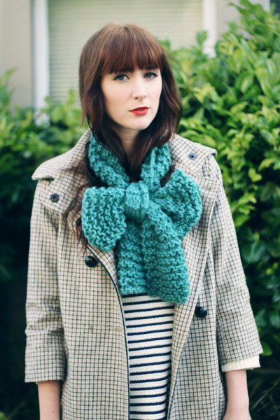 gray knitted scarf with checked trench coat