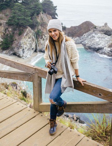 gray knitted hat with white crochet sweater and ripped jeans