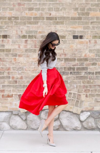 gray knitted sweater, red high-waisted flare mini dress