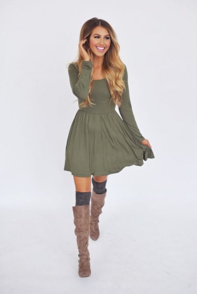 gray, long-sleeved, figure-hugging mini dress with matching boots