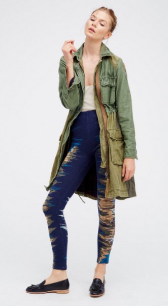 gray longline military jacket with dark blue leggings and slippers