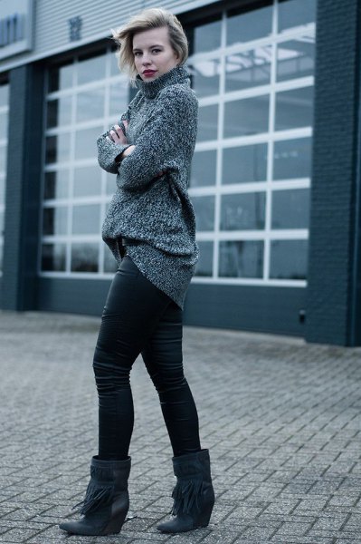 gray, coarsely cut knitted sweater with mock neck and black wedge boots made of wide calfskin