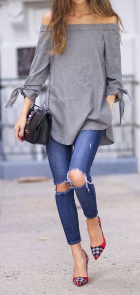 Shoulder-gray top with ripped jeans and red and black plaid flats