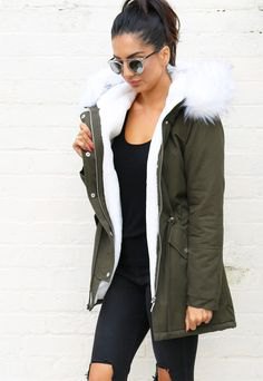 gray parka coat with a completely black outfit