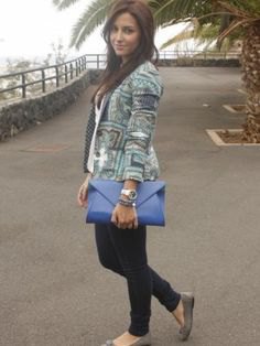 gray printed blazer with blue leather handbag