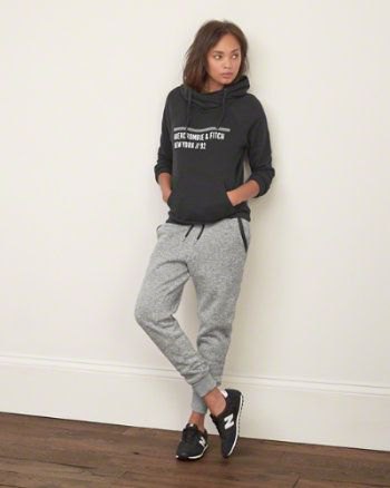 gray printed hoodie with sweatpants and black pullovers