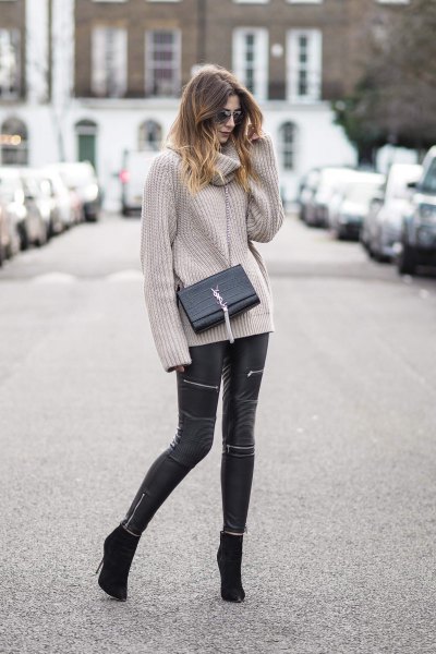gray, ribbed sweater with waterfall neckline and black leather pants