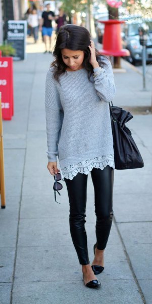 gray ribbed sweater with white tunic blouse and leather tights