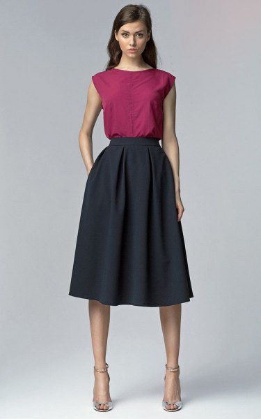 gray sleeveless top with dark blue, flared midi skirt