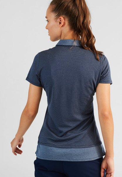 gray striped two-layer polo shirt with black jeans