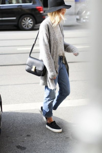 gray cardigan with blue cuffed jeans