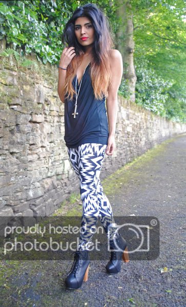 gray tank top with black and white leggings with zigzag print