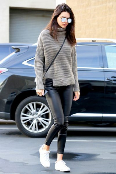 gray turtleneck with relaxed fit and black leather gaiters