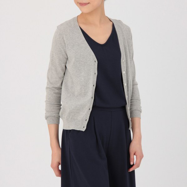 gray V-neck cardigan, black sweater and wide-leg pants