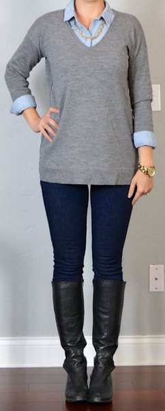 gray V-neck sweater and knee-high boots made of black leather