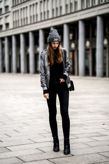 gray velvet bomber jacket with black super skinny jeans