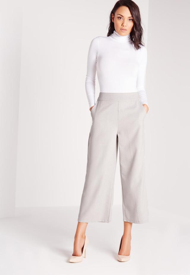 gray wide pants and white sweater