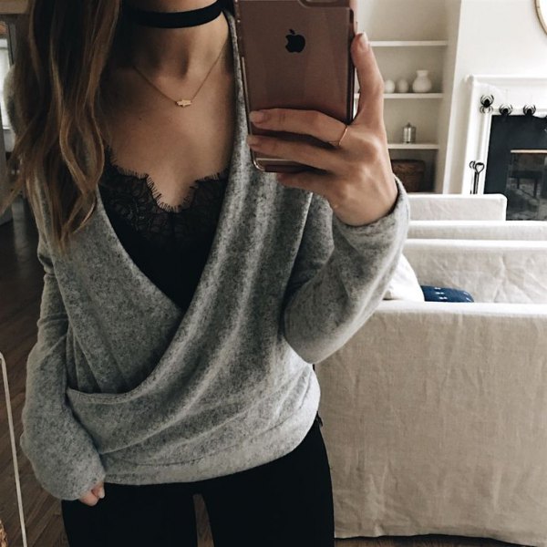 gray cardigan over black lacy vest top