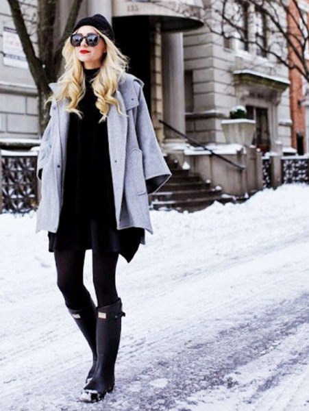 gray wool coat with black shift mini dress and knee-high snowshoes