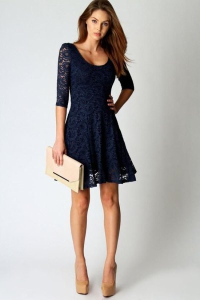 half sleeve with scoop neckline and flared, midnight blue lace mini dress