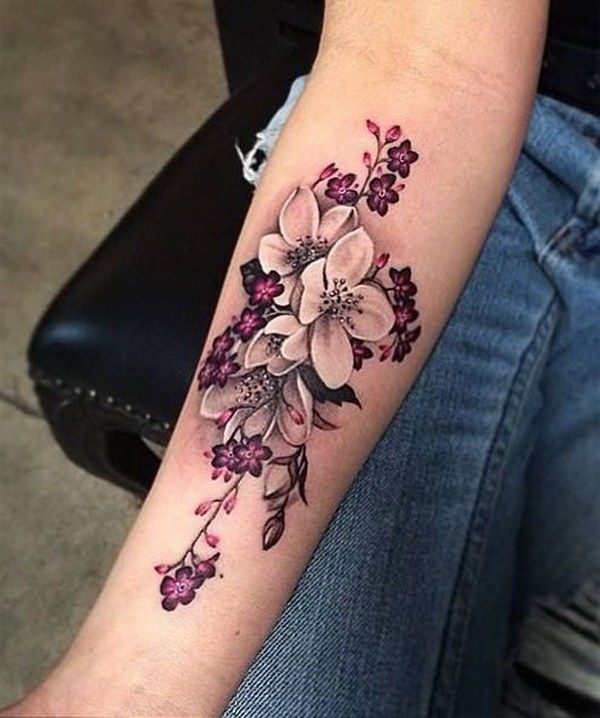 Hawaiian flower tattoo on forearm