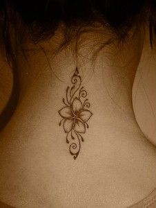 hawaiian flower tattoo on neck