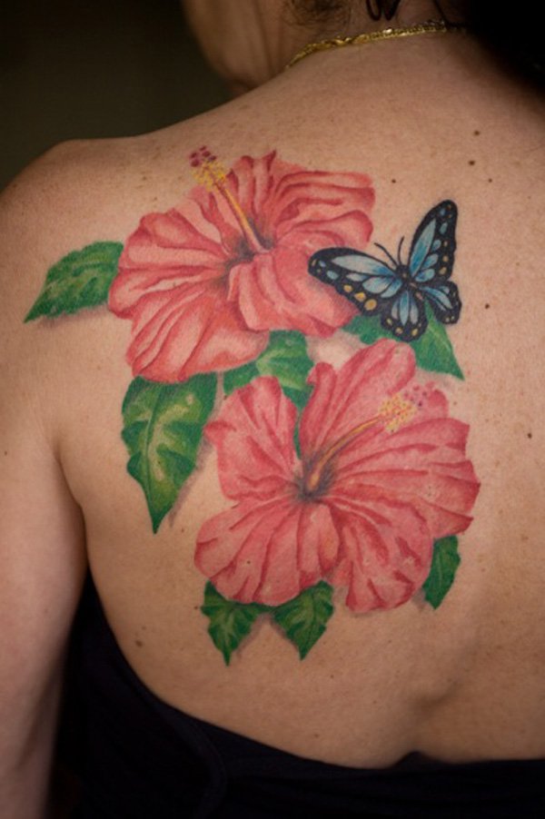 Hawaii flower with butterfly tattoo on the upper back
