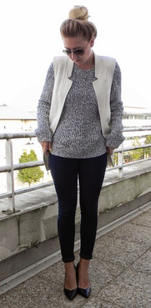 heather gray knitted sweater with round neckline, white vest