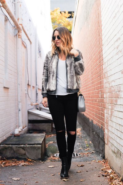 heather gray fur bomber jacket with black, torn slim fit jeans