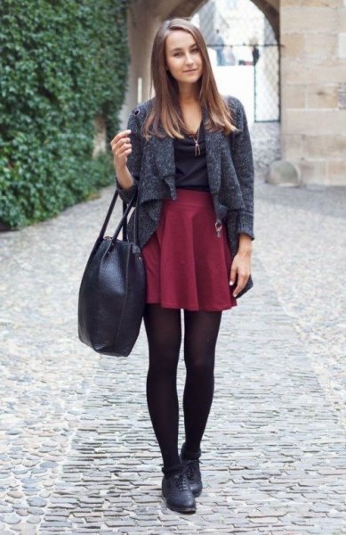 heather gray short wool jacket with a maroon mini pleated skirt